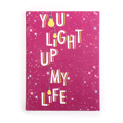 دفتر بعنوان You Light Up My Life